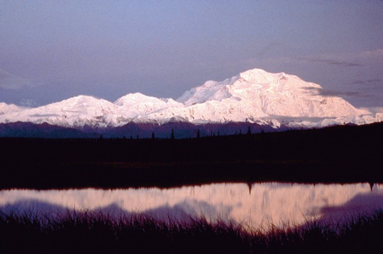 Reflections help to make this photo of Mt. Denali more interesting.