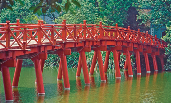 Underexposing the shot slightly helps saturate the red of the bridge.