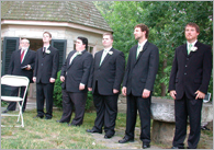 The dark suits worn by the wedding party fool the camera, overexposing the shot.