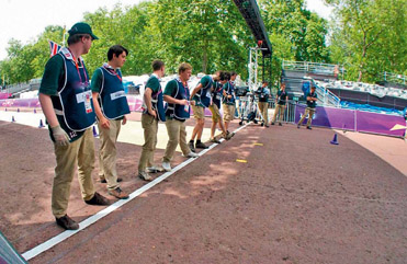 Figure 11.9 Staff lined up as “athletes” in order to provide athletes for a camera rehearsal at the Olympics.