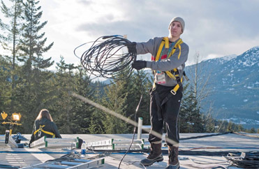 Figure 2.11 The utility assists the engineering staff in setting up and tearing down equipment and cables.