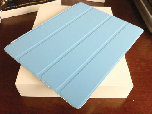 Available in a rainbow of colors, the iPad 2 Smart Cover protects the iPad's display while adding very little weight or thickness.