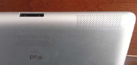 The iPad speaker openings (right) and Dock Connector port (left)