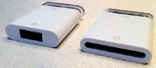 The iPad Camera Connection Kit consists of a USB adapter (left) and an SD memory card reader (right).