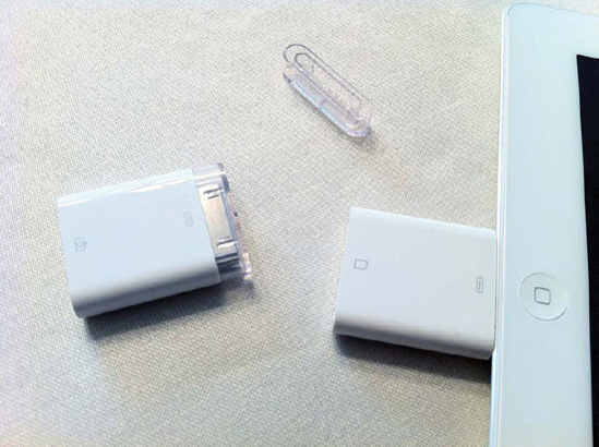 The iPad Camera Connection Kit features a USB adapter and an SD card reader.