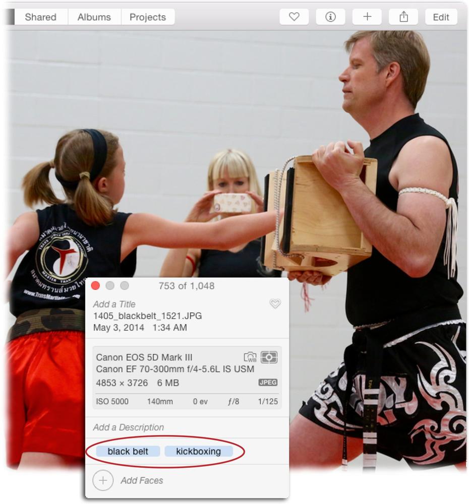 If you use the Info panel to add a keyword you’ve never used before, Photos adds it to your keyword list the second you press Return. To enter a keyword phrase such as black belt, type both words, and then press Return.Photos displays your keywords in alphabetical order in the Info panel regardless of the order you entered them.(Mr. Grace and his daughter are pictured here during her black-belt test in Muay Thai kickboxing.)