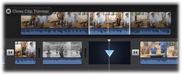 To open the Clip Trimmer, double-click any clip in the storyboard. In the Trim window, the white borders show which piece of the clip you’re currently using in your movie. The darkened portions of the clip show the rest of that clip’s raw footage. Drag either white line to lengthen or shorten the clip, or drag the clip itself to reposition it in your project.