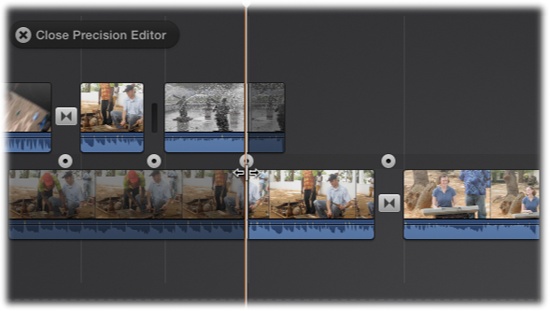 Behold the Precision Editor! The top layer holds the clips leading into a cut. The bottom layer contains the clips trailing the cut. You adjust the position of the cut by dragging the dot between the layers. Adjust the clips surrounding the cut by dragging the clips themselves. (The other dots running along the bar between the layers represent the different transitions and cuts in your project.)