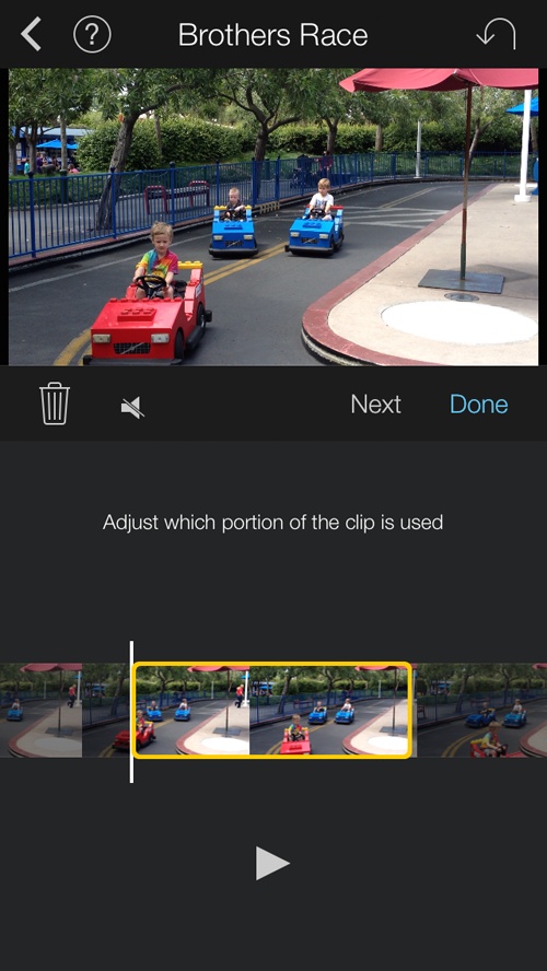 To edit a trailer clip, drag the filmstrip around to position it at just the right moment. You can also mute or unmute the clip using the speaker button. (iMovie mutes trailer clips by default.) Tap to preview the shot before you tap Done. Tap the trash can if you want to delete the footage and start over with a different shot.
