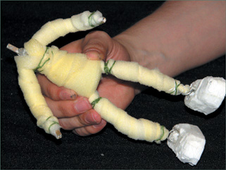 Floral wire will keep the foam in place around the armature.