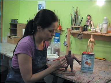 Kathi Zung refines a puppet sculpt in oil-based clay. (Copyright Zung Studio.)