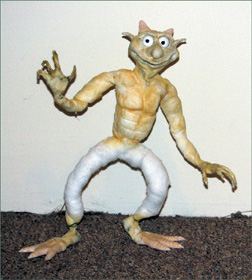 Here is the goblin with his feet, body, hands, and head completely painted in latex.