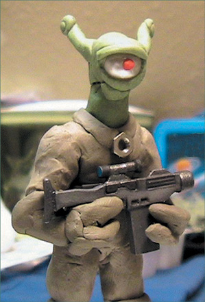 “Trooper of Xon” puppet with gun prop. (Courtesy of Michael Stennick, Space Monster Pictures.)