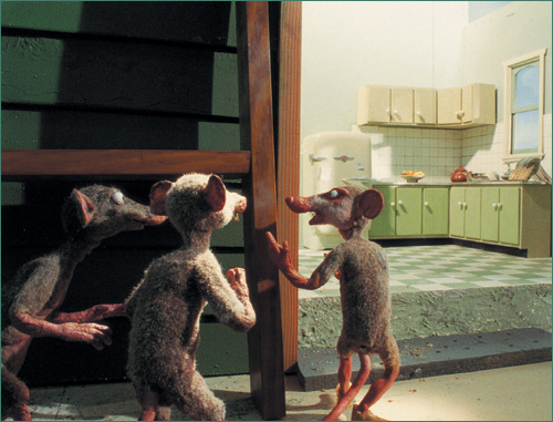 Placement and posing of the rats, combined with lighting from an open kitchen area, tells the story and draws in the audience within one shot. (Courtesy of Nick Hilligoss/Australian Broadcasting Corporation.)