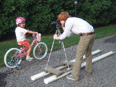 Tack the gutters down with wax, tape, or even screws if possible. Place the dolly in the gutters and roll the dolly along the track of the gutters to capture the motion tracking video. Copyright © Steve Weinrebe