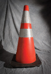 Use an orange safety cone to protect yourself from being run into while on video shoots. Copyright © Steve Weinrebe
