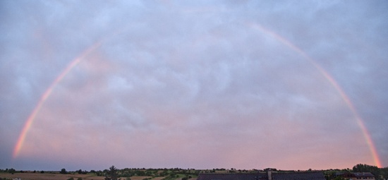 This image of a rainbow is a panorama made from two HDRI images, each of which consists of two separate source images.