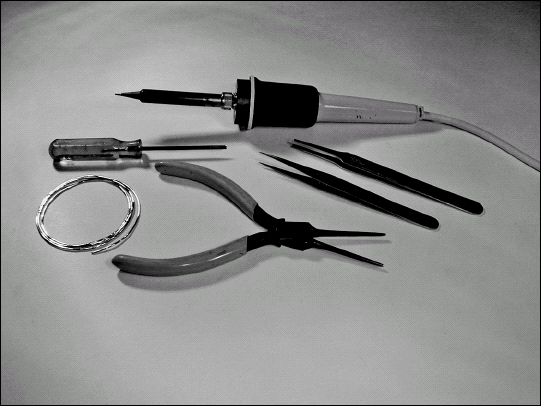 Surface-mount tools. Note the fine tip on the soldering iron.