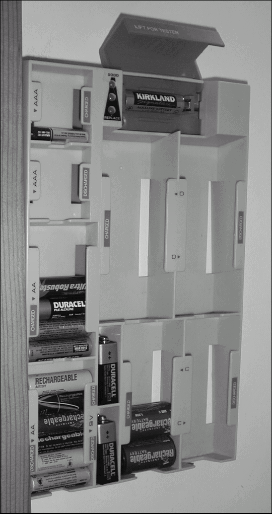 A battery tester applies a small load to the battery when measuring battery voltage, causing the voltage from weak batteries to drop, which identifies a marginal battery that would otherwise test as good.