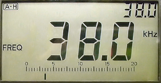 Meter displaying 38-kHz frequency measurement