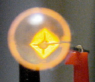 Glowing die with a view of the bonding wire and bonding site