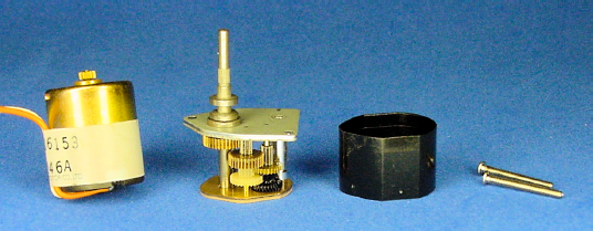 Spur gearhead motor consists of: (left to right) DC brush motor, spur gearbox, gearbox cover, and joining screws.