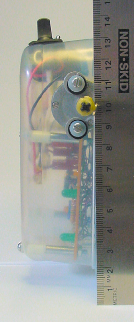 A ruler measuring the distance from the front of the robot to the center of the motor shaft