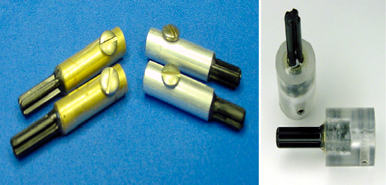 Two brass couplers (left) and two aluminum couplers (middle) made with tubing. Two plastic couplers (right) made on a lathe or milling machine out of solid rod.