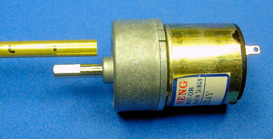 3/16-inch diameter tubing held beside the motor shaft to mark the desired length