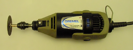 Dremel variable-speed rotary tool with cut-off wheel accessory