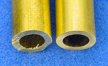 Freshly cut tubing showing scratches and burrs (left). Finished tubing sanded flat and clean (right).
