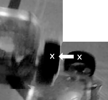 Frames two and seven superimposed to show wheel roll. If the wheel had stayed in place, the "x" marks would be directly on top of each other. (Please excuse the quality of this image; it came from a video camera. Even so, it does show that the wheel has moved forward instead of pivoting in place.)
