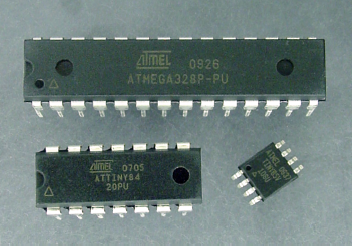 Atmel microcontrollers: ATmega328 (top), ATtiny84 (bottom left), and ATtiny85V (bottom right)