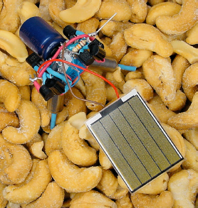 Appetizer, a BEAM robot, charging its rear capacitor from its front solar panel