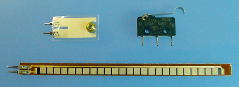 Touch sensors: vibration sensor (top left), snap-action level switch (top right), and Jameco #150551 $12.95 flex sensor (bottom)