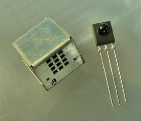 Metal-encased infrared photodetector to suppress false signals due to electrical noise (left) and standard Panasonic PNA4602M infrared photodetectors (right)