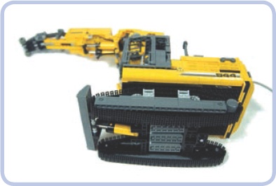 My model of the Liebherr R944C tunneling excavator housed more motors in the chassis than it did in the superstructure, at the cost of nearly zero ground clearance. With more space available inside the superstructure, I was able to take better care of its aesthetics.