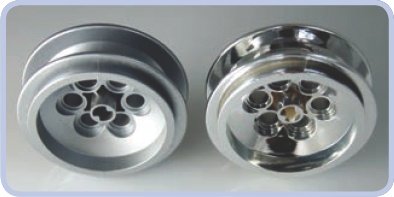The 62.4×20 wheel in stock metallic silver (left) and custom chromed by Chrome Block City (right). Note that the inside of the custom-chromed piece’s axle hole lacks chrome film and shows that the wheel was originally white.