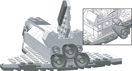 You now get to see why I used Technic bricks to build the end of the body. The insert shows the rear of the shuttle without all the cones in place. This should help you understand how I attached these pieces.