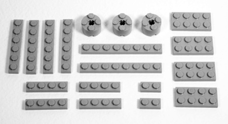 Set out the parts for the model and take a picture of them before beginning construction. In this case, I show the pieces needed to build a 4X 1x2 plate.