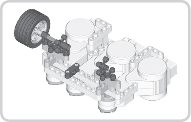 The outer motors transfer motion through a set of axles and knob wheels. The wheel to the left is completely assembled, and the one on the right is not, making it easier to see how the knob wheels are positioned.