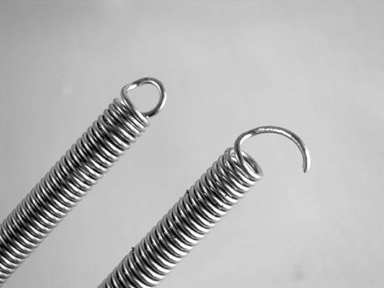 The end of the spring before (left) and after (right) being opened into a hook