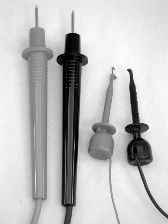 A set of probes (left) and mini-clip leads (right); the latter are retractable hook leads, also called mini-clip jumpers, and are easy to clip to the leg of a single PCB-mounted component without creating a short circuit