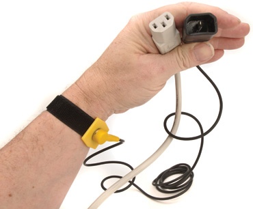 The safest way to handle electronics is by using a wrist strap to protect against ESD. This is most necessary if you are working in an environment with high static electricity, such a carpeted room in the middle of winter when humidity is low.