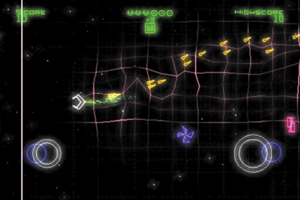 Players control Geometry Wars: Touch by moving their fingers over the two white circles at the bottom of the screen as though they were joysticks.