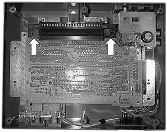 Grip the connector from the points shown