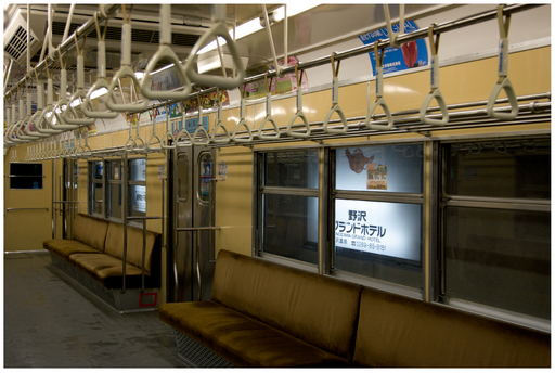 FIGURE 30 Inside a subway car in Japan. The visual rhythm implies that the handles go on for a while, making the car seem bigger.