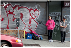 FIGURE 16 While walking around Chinatown, we found this garage door with graffiti and saw the bags on the ground. We knew that someone would come by to grab the bags at some point, and the pink bag made us decide to stop and see what type of person would show up. A young Asian woman with distinctive white iPod headphones and an “I love San Francisco” sweatshirt came to watch her bags (A). The juxtaposition of the graffiti, headphones, sweatshirt, and girl created a scene that really expresses San Francisco’s unique culture. With our “actress” in place, we took a variety of shots, not knowing how long she would stay there and how long cars would stay clear of the shot (B, C, D, E). Because we were shooting in between a car on the street and a trash can, we were limited in how much we could move. Furthermore, there was a man standing to screen right, and adding him in (F) changed the shot from a story about the girl, which we wanted to tell, to a story about the relationship between the girl and the man (also interesting as a young-and-old story, but not what we were shooting). A minute later, she picked up her bags and left.