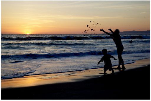 FIGURE 2 We went down to the beach hoping for a spectacular sunset that didn’t materialize, but because we tuned in to what else was going on, we captured a fun shot of a mother playing with her young child.