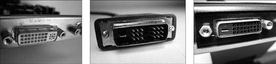 A DVI port on a video card (left), cable connector (middle), and monitor (right).